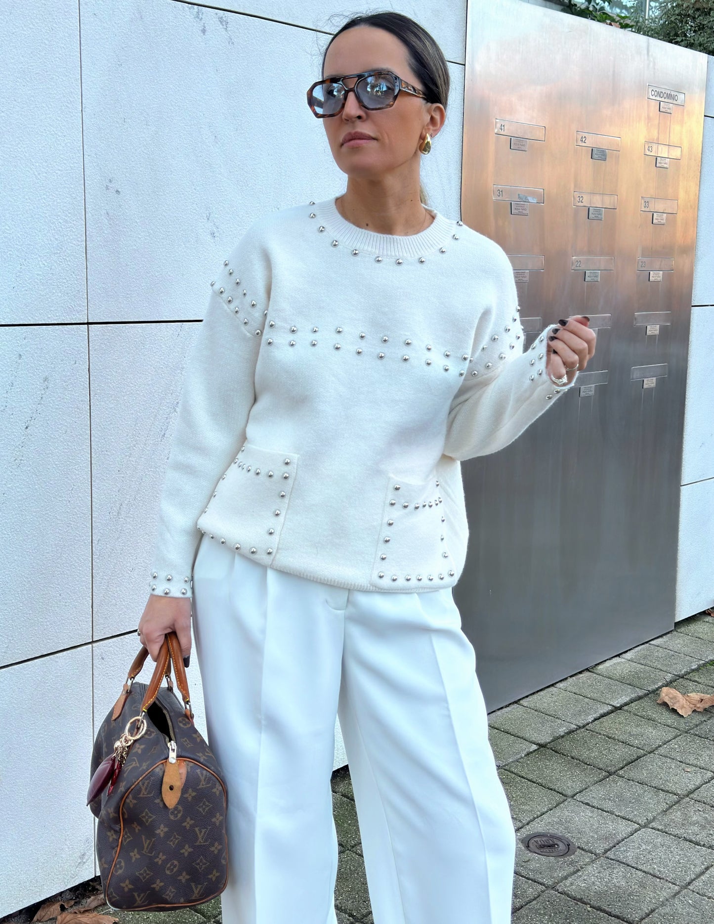 Studded knitted sweater in white
