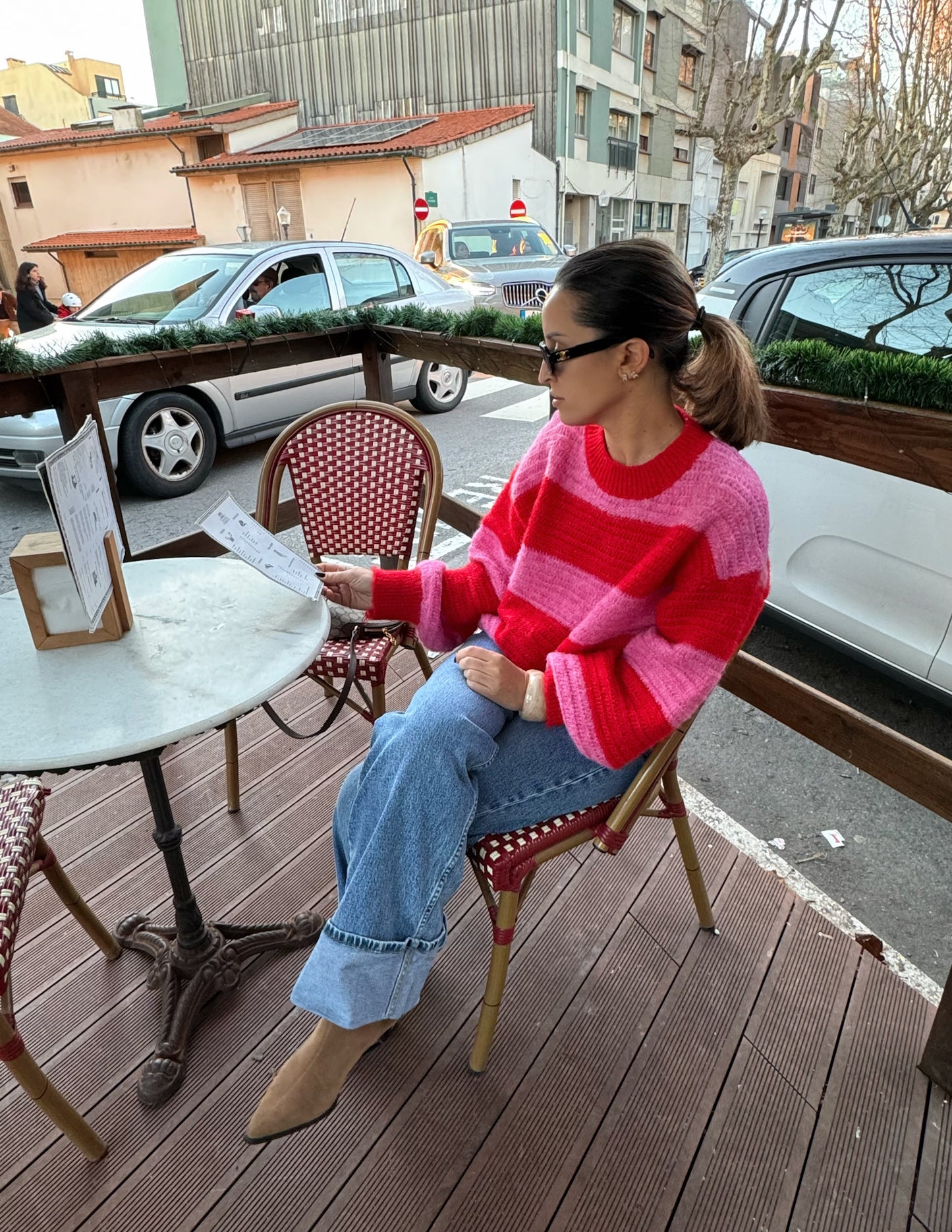 Pink and red knitted sweater