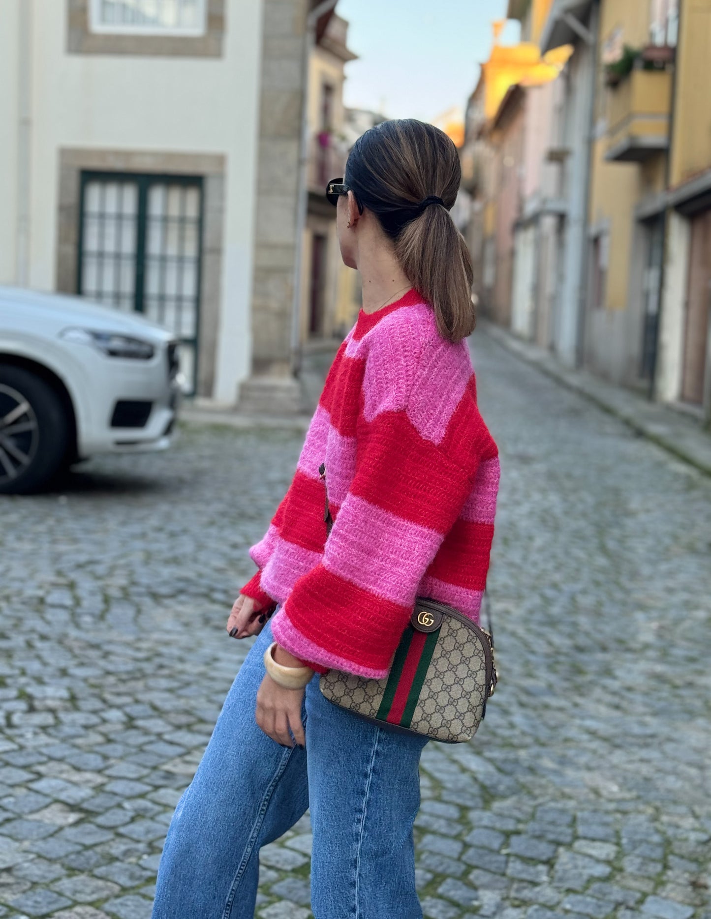 Pink and red knitted sweater