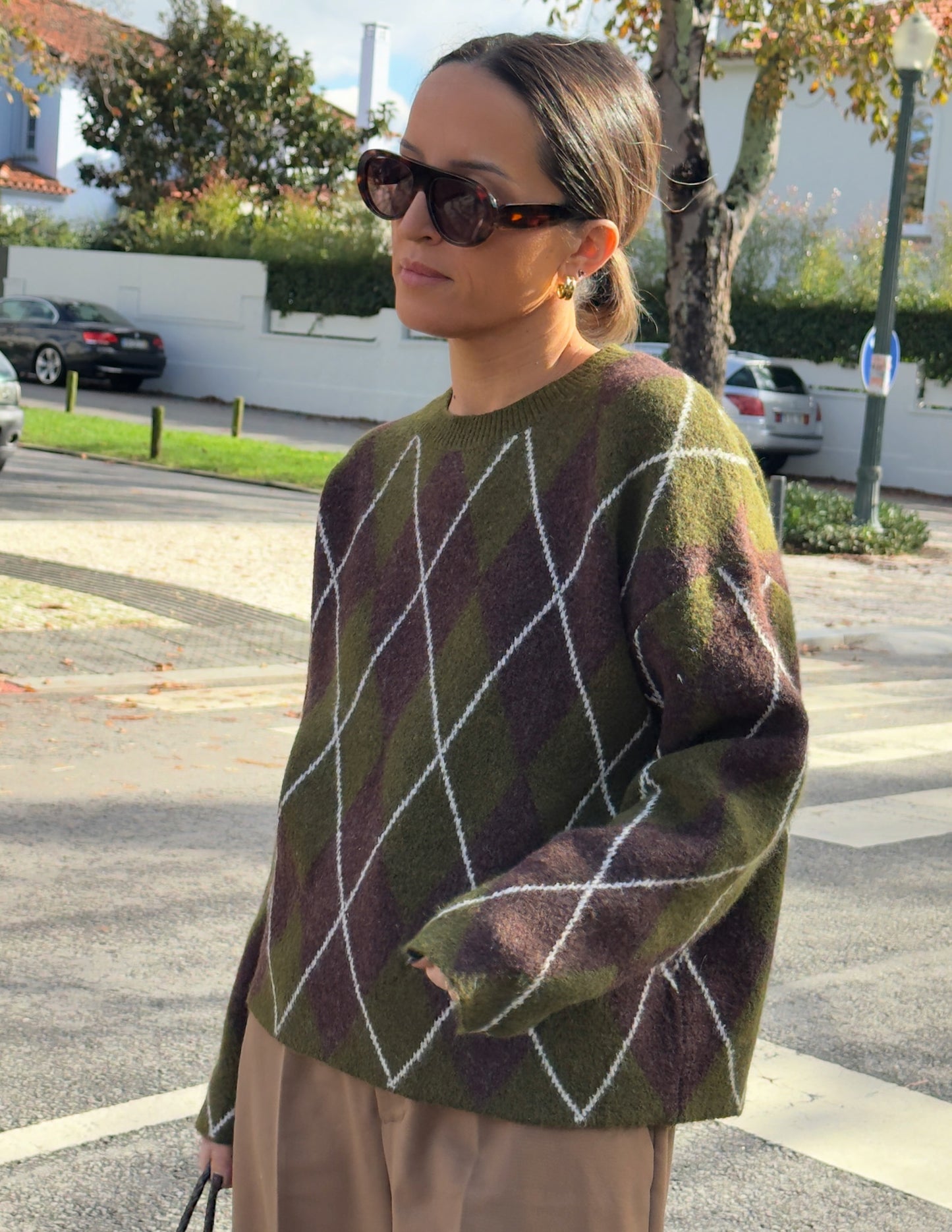 Green and brown diamond pattern sweater