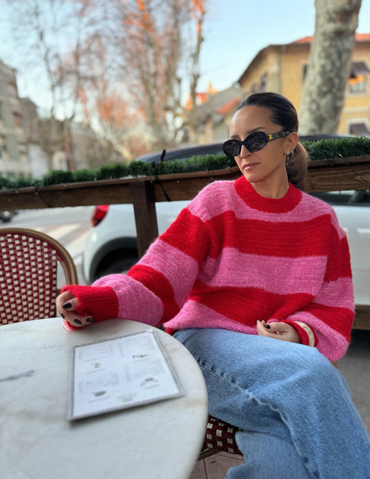 Pink and red knitted sweater