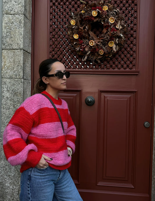 Pink and red knitted sweater