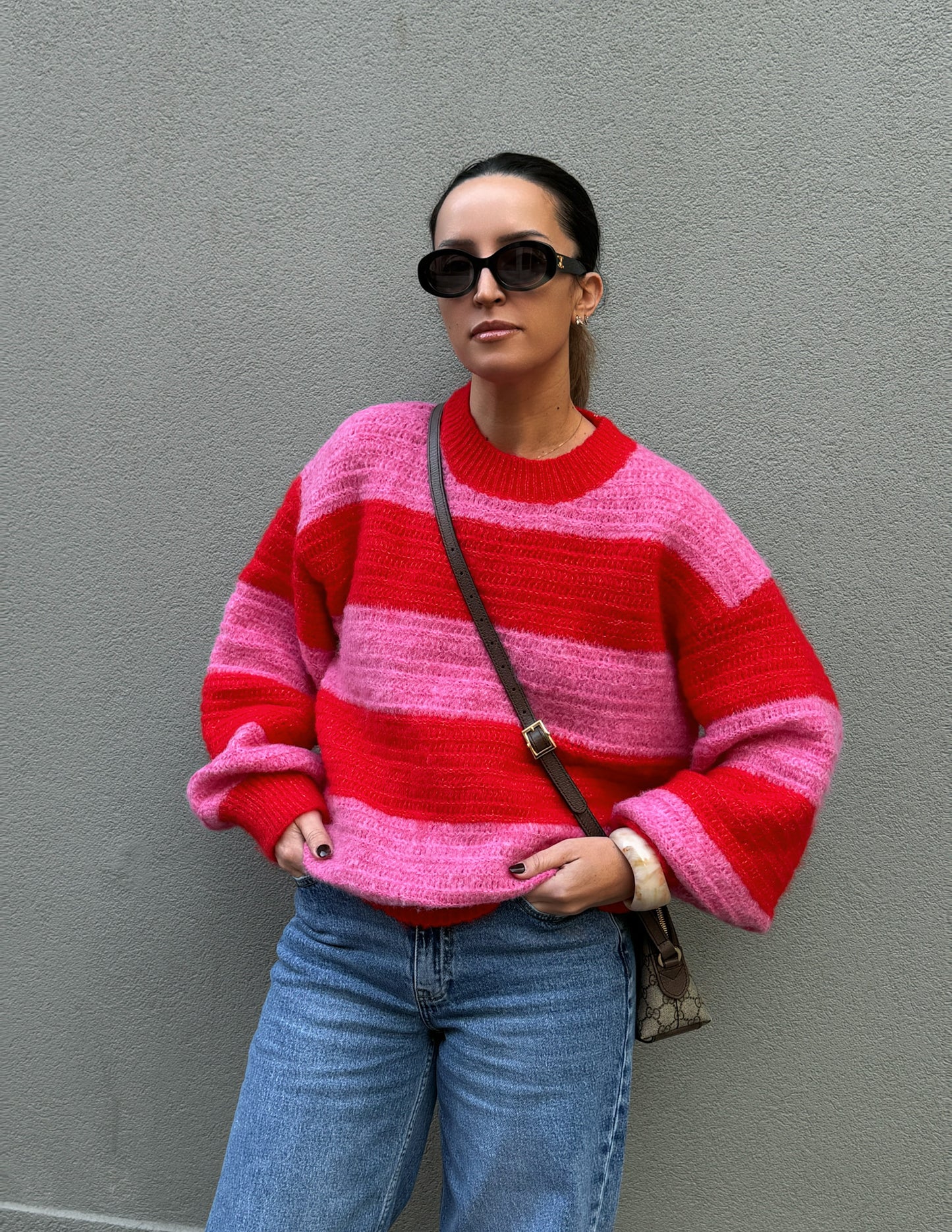 Pink and red knitted sweater