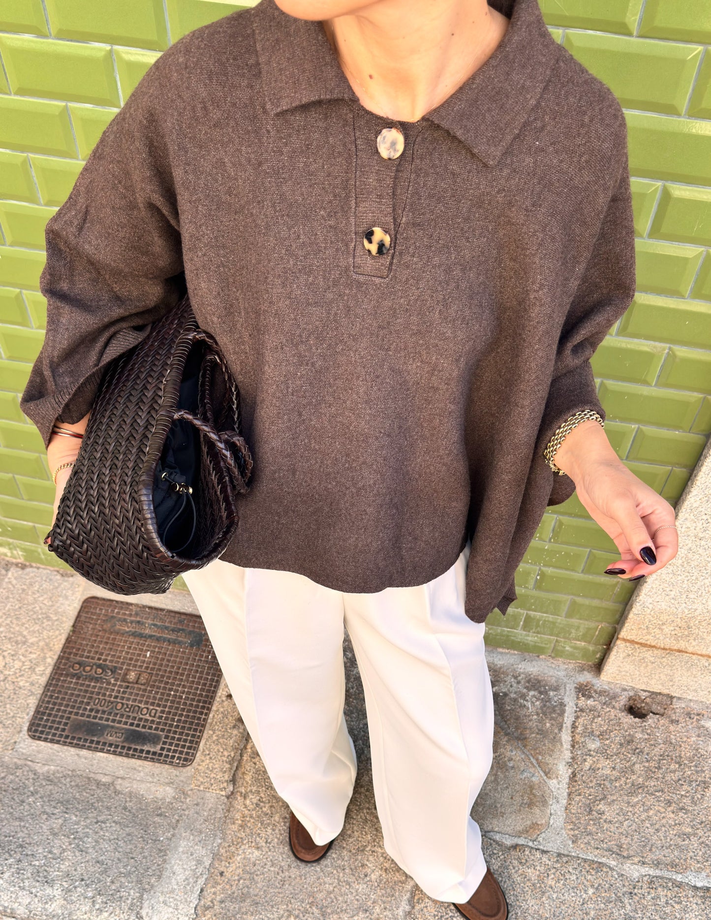 Knitted cape-style sweater